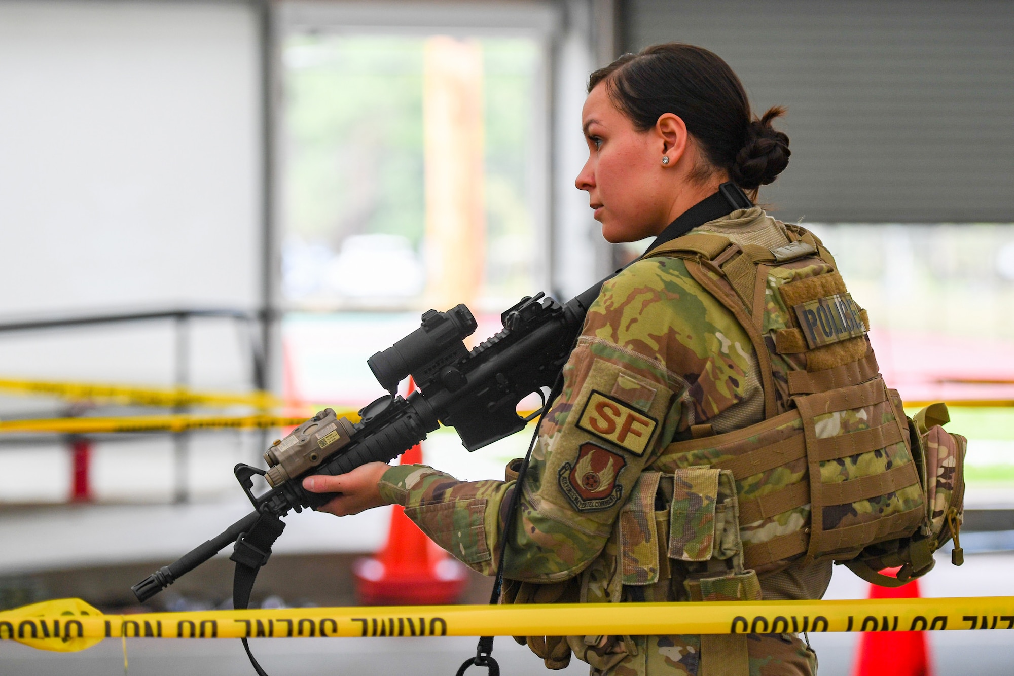 Female Airman participates in training