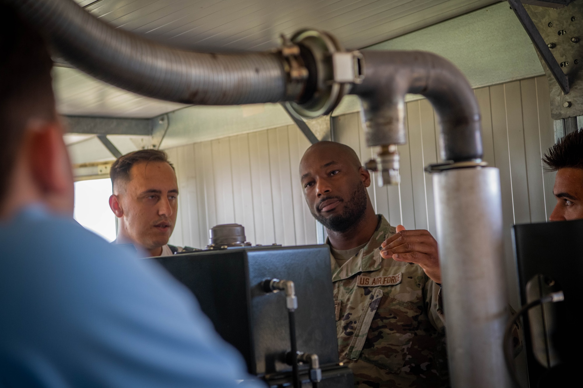 Service members participate in training.