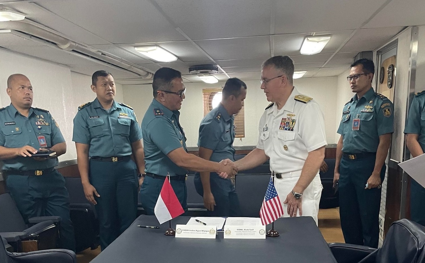 JAKARTA, Indonesia (July 22, 2022) – U.S. Navy Rear Adm. Rick Seif, commander, Submarine Group 7/Task Force 74 signs the 6th Indonesian National Military-Naval Force and U.S. Navy Submarine Force Staff Talks action items aboard the Emory S. Land-class submarine tender USS Frank Cable (AS 40) in Jakarta, Indonesia, July 22, 2022. Submarine Group 7 directs forward-deployed, combat capable forces across the full spectrum of undersea warfare throughout the Western Pacific, Indian Ocean, and Arabian Sea. (Photo courtesy of Lt. Haley Bonner)