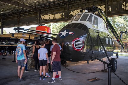 High school students tour a museum during summer camp.