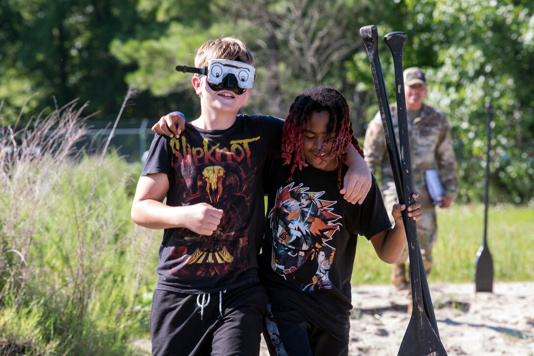 High school students work on a task during summer camp.