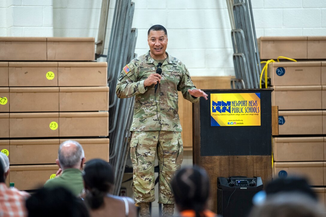 A Soldier speaks to high school students.