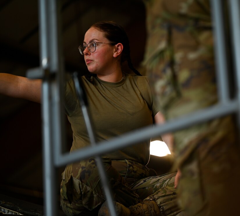 SPECS Airman gives a tour of an F-22 Raptor