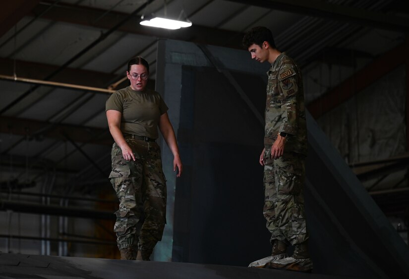 SPECS Airman gives a tour of an F-22 Raptor