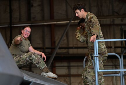 SPECS Airman gives a tour of an F-22 Raptor