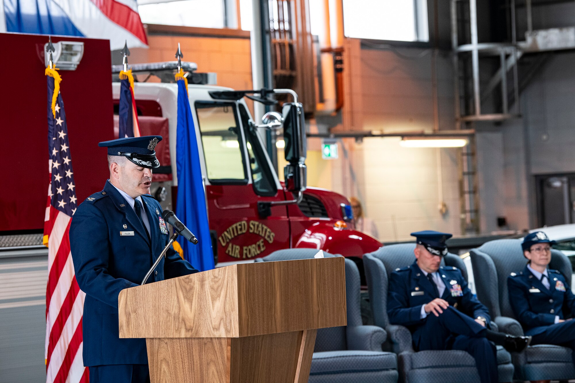 U.S. Air Force Col. Brian Filler, left, 501st Combat Support Wing commander, speaks during a change of command ceremony at RAF Alconbury, England, July 25, 2022. During the ceremony, Col. Richard Martin relinquished command of the 423d Air Base Group to Col. Valarie Long. (U.S. Air Force photo by Staff Sgt. Eugene Oliver)