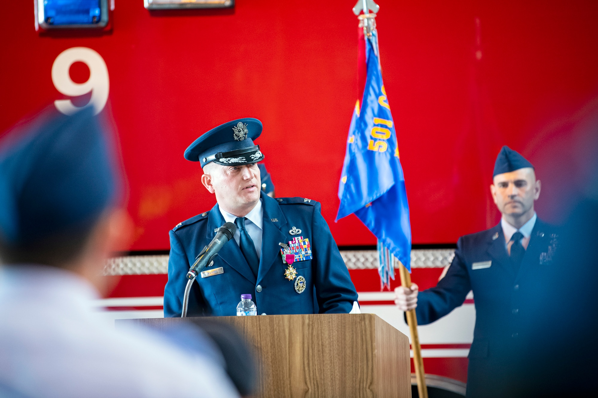 U.S. Air Force Col. Richard Martin, 423d Air Base Group outgoing commander, speaks during a change of command ceremony at RAF Alconbury, England, July 25, 2022. During his command, Martin led a unit that provided a full range of operational, logistical, engineering, medical and communications support and community services to 6,500 military and civilian personnel and families at 4 installations. (U.S. Air Force photo by Staff Sgt. Eugene Oliver)