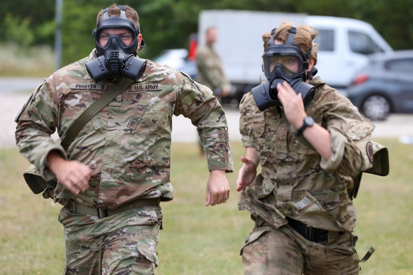 Participants for MREP 2022 work together on team building exercises at Camp Nymindegab July 4, 2022. MREP is a program that houses almost 130 participants from 6 different nations, to increase interoperability, strengthen partnerships, and to enhance professional development between allies.