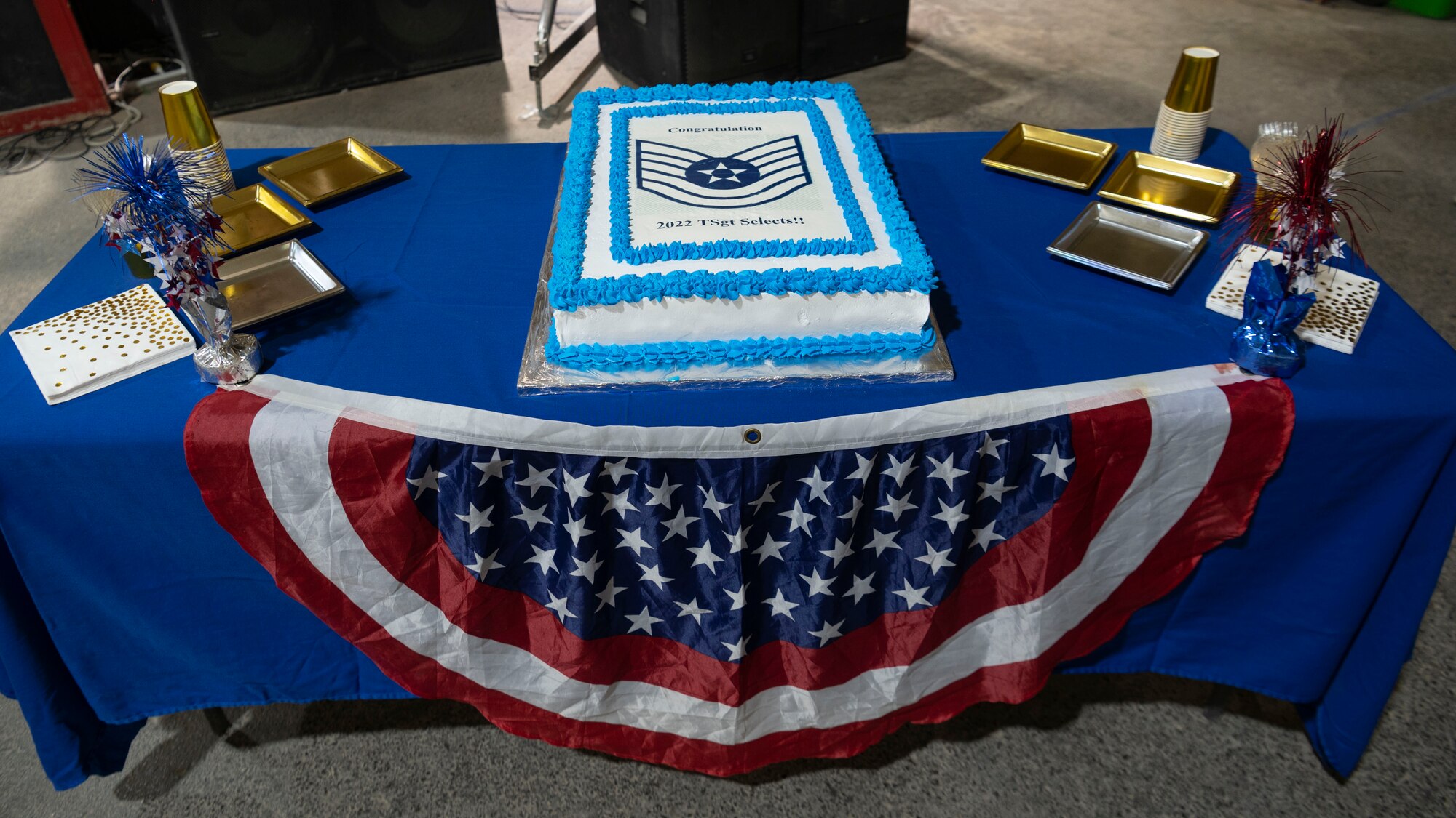 The 332d Air Expeditionary Wing celebrates with an E-6 release party for those Airmen selected to promote to Technical Sergeant at an undisclosed location in Southwest Asia, July 23, 2022. 332d AEW Commander Brigadier General R. Ryan Messer along with Command Chief Master Sergeant Kevin M. Eberlin help celebrate the occasion. Promotion to TSgt is very competitive, this year the promotion rate is only 16%. Promotions exemplify technical skills, leadership, and a standard of excellence. (U.S Air Force photo by Tech. Sgt. Jeffery Foster)