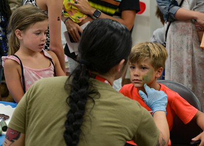 Children get their face painted