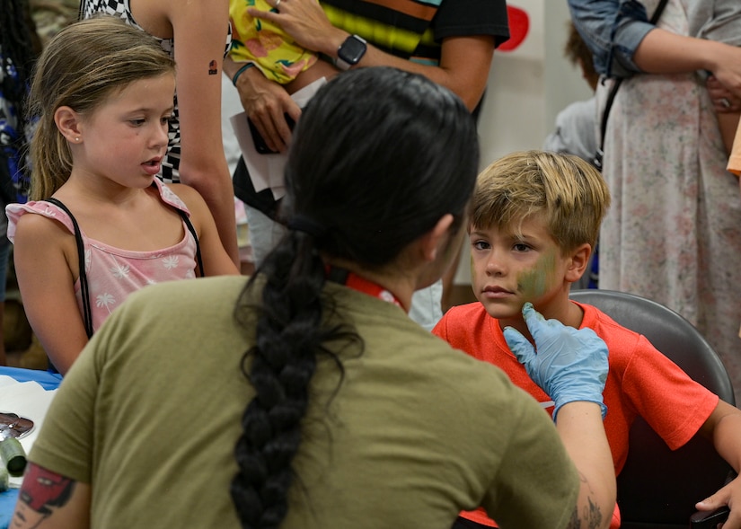 Children get their face painted