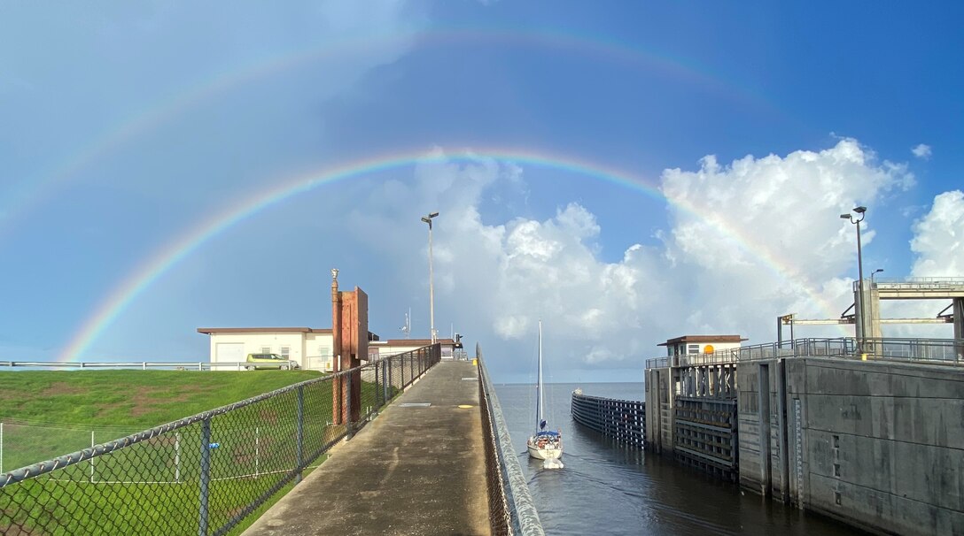 A sailboat locks through the Port Mayaca Lock and Dam into Lake Okeechobee