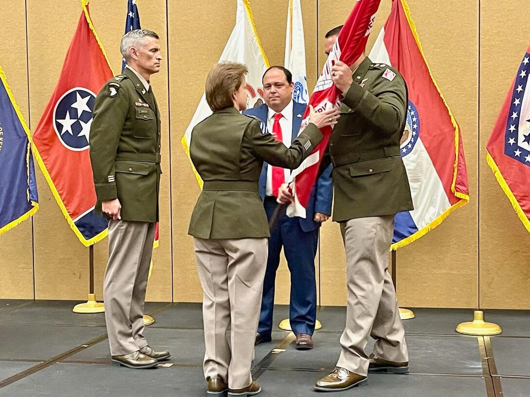 Col. Brian D. Sawser (far left) receives the Memphis District colors from Mississippi Valley Division Commander Maj. Gen. Diana M. Holland (center-left), which symbolizes the assumption of command from Lt. Col. Robert W. Green (far right), Memphis District deputy commander. 

The passing of the colors symbolizes the transfer of authority to the incoming commander. Because of the reverence the commanders feel toward the colors, it is kept over their heart during the transfer. The passing of the colors demonstrates to the Soldiers and Civilians of the organization that the old commander has passed the mantle of leadership to the new commander, and with this, also passes the loyalty of the workforce to their new commander.