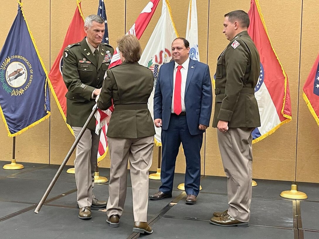 Col. Brian D. Sawser (far left) receives the Memphis District colors from Mississippi Valley Division Commander Maj. Gen. Diana M. Holland (center-left), which symbolizes the assumption of command from Lt. Col. Robert W. Green (far right), Memphis District deputy commander. 

The passing of the colors symbolizes the transfer of authority to the incoming commander. Because of the reverence the commanders feel toward the colors, it is kept over their heart during the transfer. The passing of the colors demonstrates to the Soldiers and Civilians of the organization that the old commander has passed the mantle of leadership to the new commander, and with this, also passes the loyalty of the workforce to their new commander.
