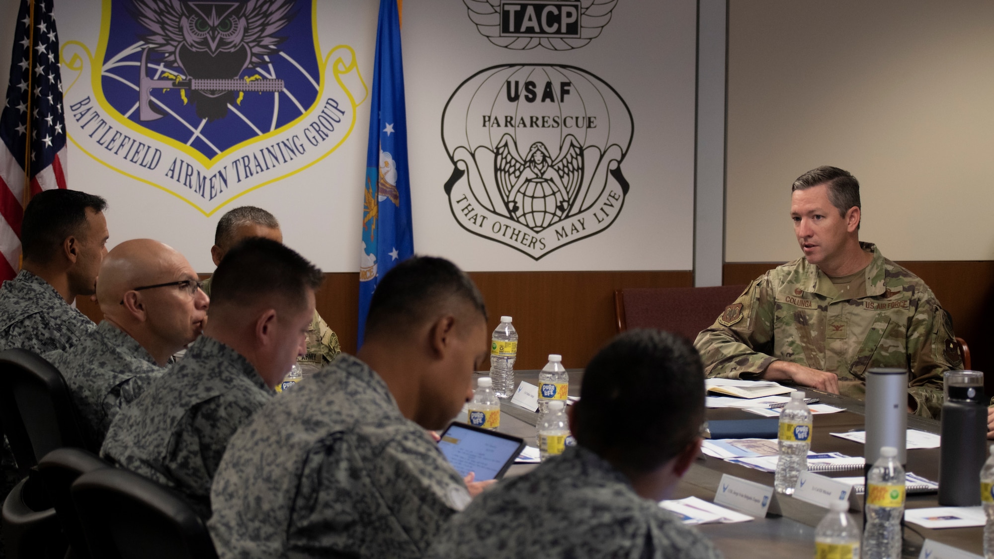 U.S. Air Force Col. Nathan Colunga (right), Special Warfare Training Wing commander, briefs a delegation of Colombian Special Air Commands leaders on the SWTW at Joint Base San Antonio-Chapman Training Annex, Texas, July. 25, 2022. The delegation visited the Special Warfare Training Wing for an immersion into the various Air Force Special Warfare career fields and pipelines.