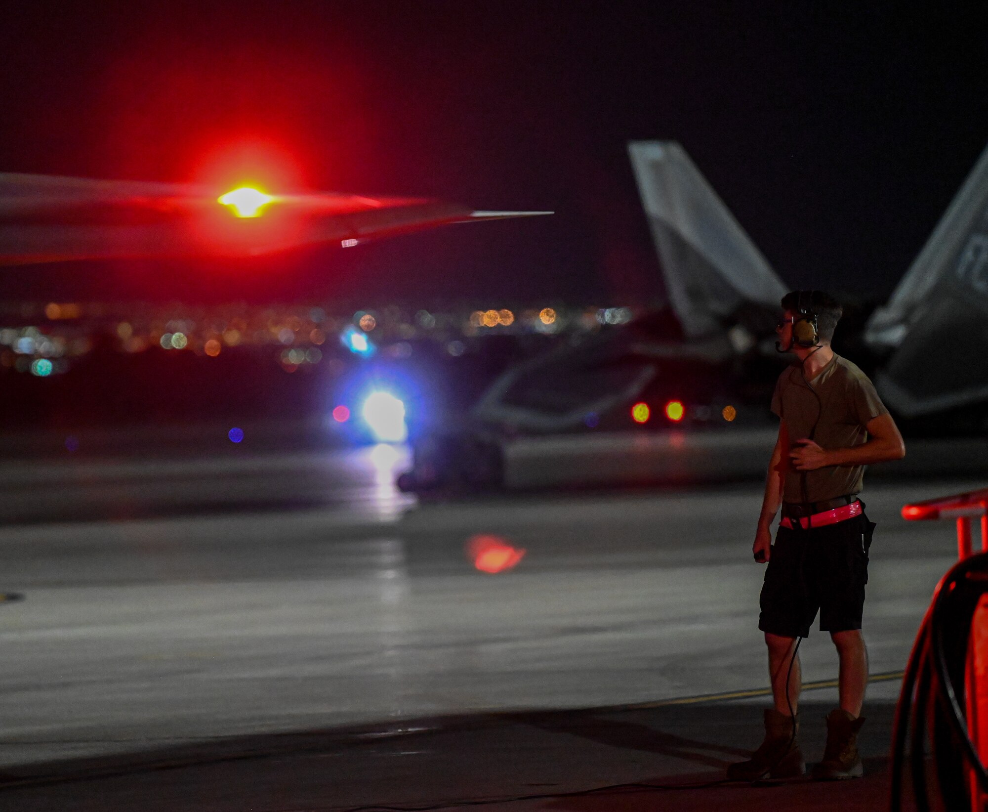 F-22 Raptors prepare to taxi on the flightline