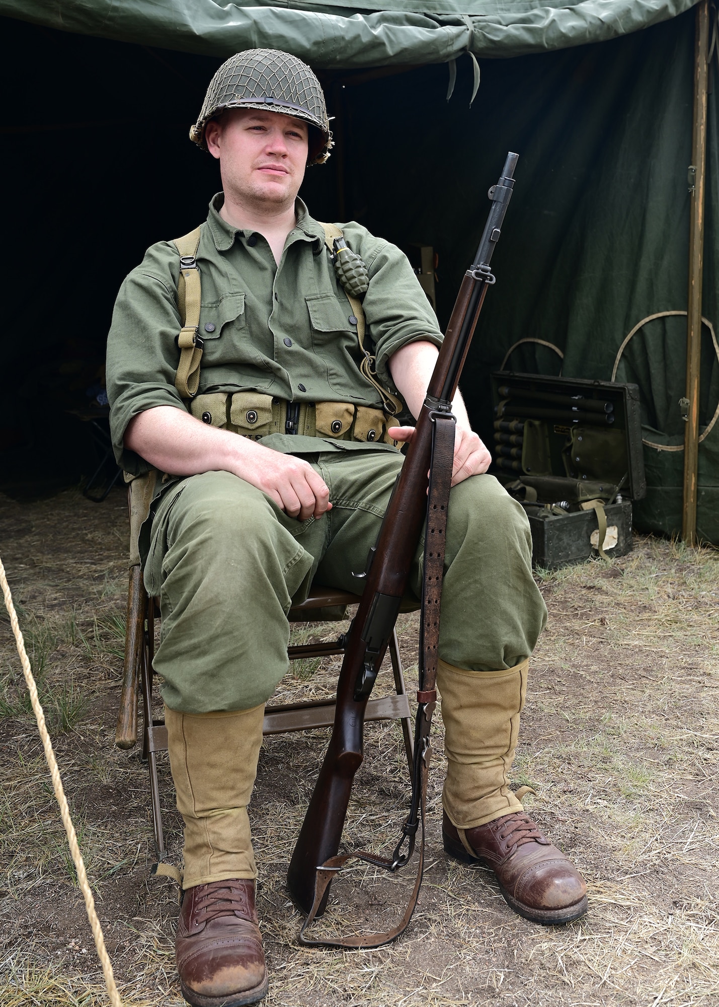 World War II paratrooper reenactor posing