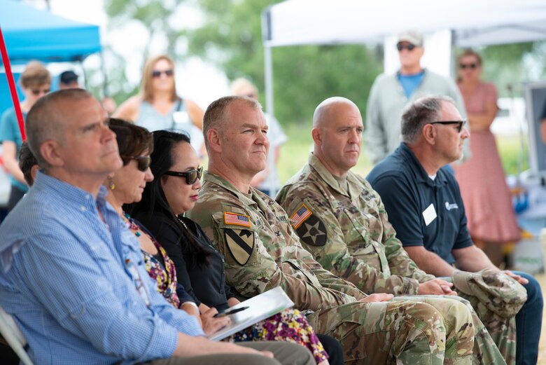 Leadership from the Department of Interior, the  U.S. Army Corps of Engineers, and the U.S. Bureau of Reclamation, attend the ribbon cutting ceremony for the Lower Yellowstone Bypass Channel in Glendive, Mont., July 26, 2022. (U.S. Army Corps of Engineers Photo by Jason Colbert)