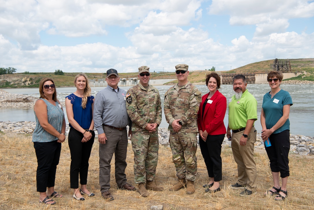 Col. Geoff Van Epps, Commander, U.S. Army Corps of Engineers Northwestern Division, and Col. Mark Himes, Commander, USACE, Omaha District, pose with the Omaha District members responsible for the completion of the Lower Yellowstone Bypass Channel in Glendive, Mont., July 26, 2022. (U.S. Army Corps of Engineers Photo by Jason Colbert)