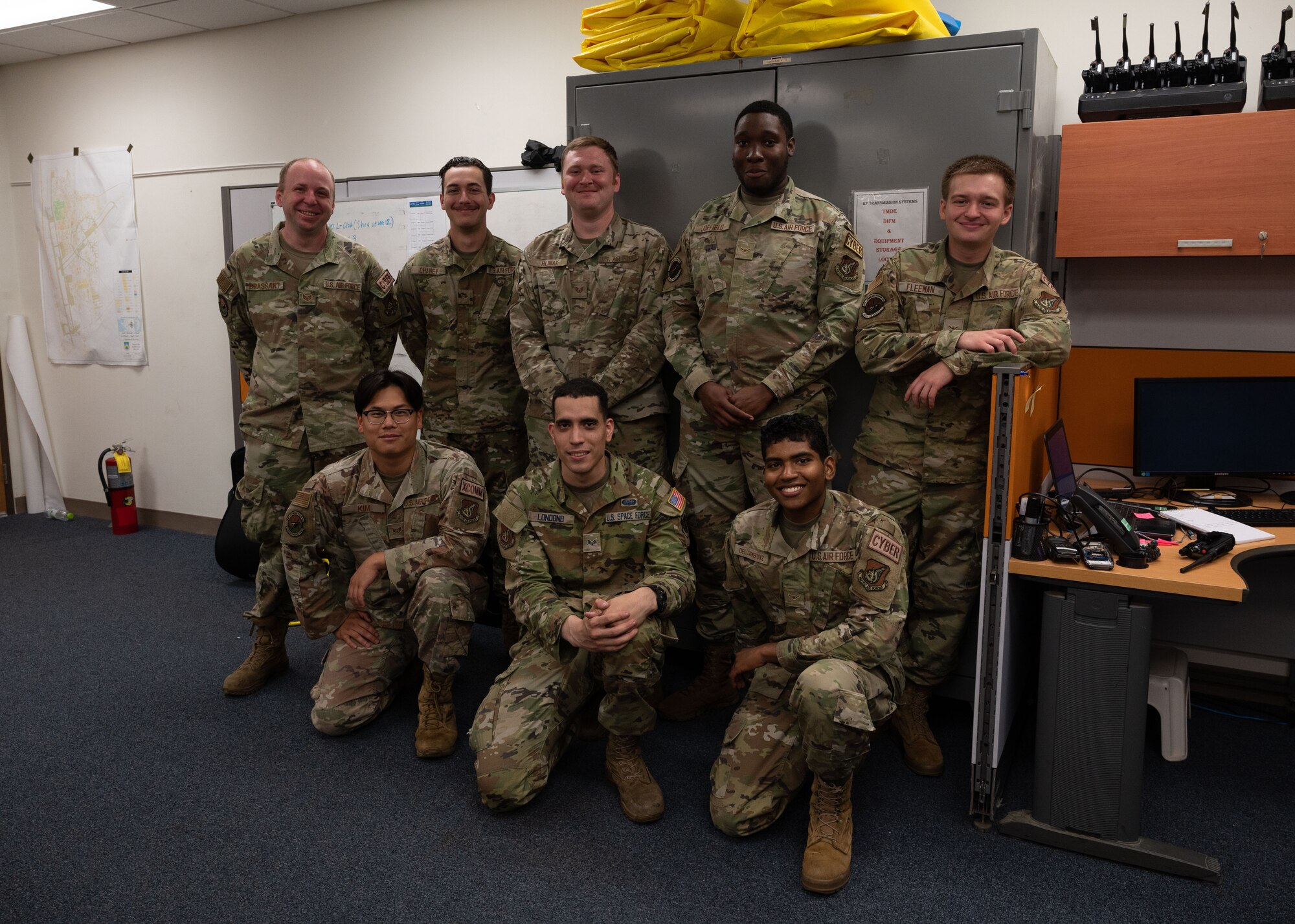Military members pose for a photo