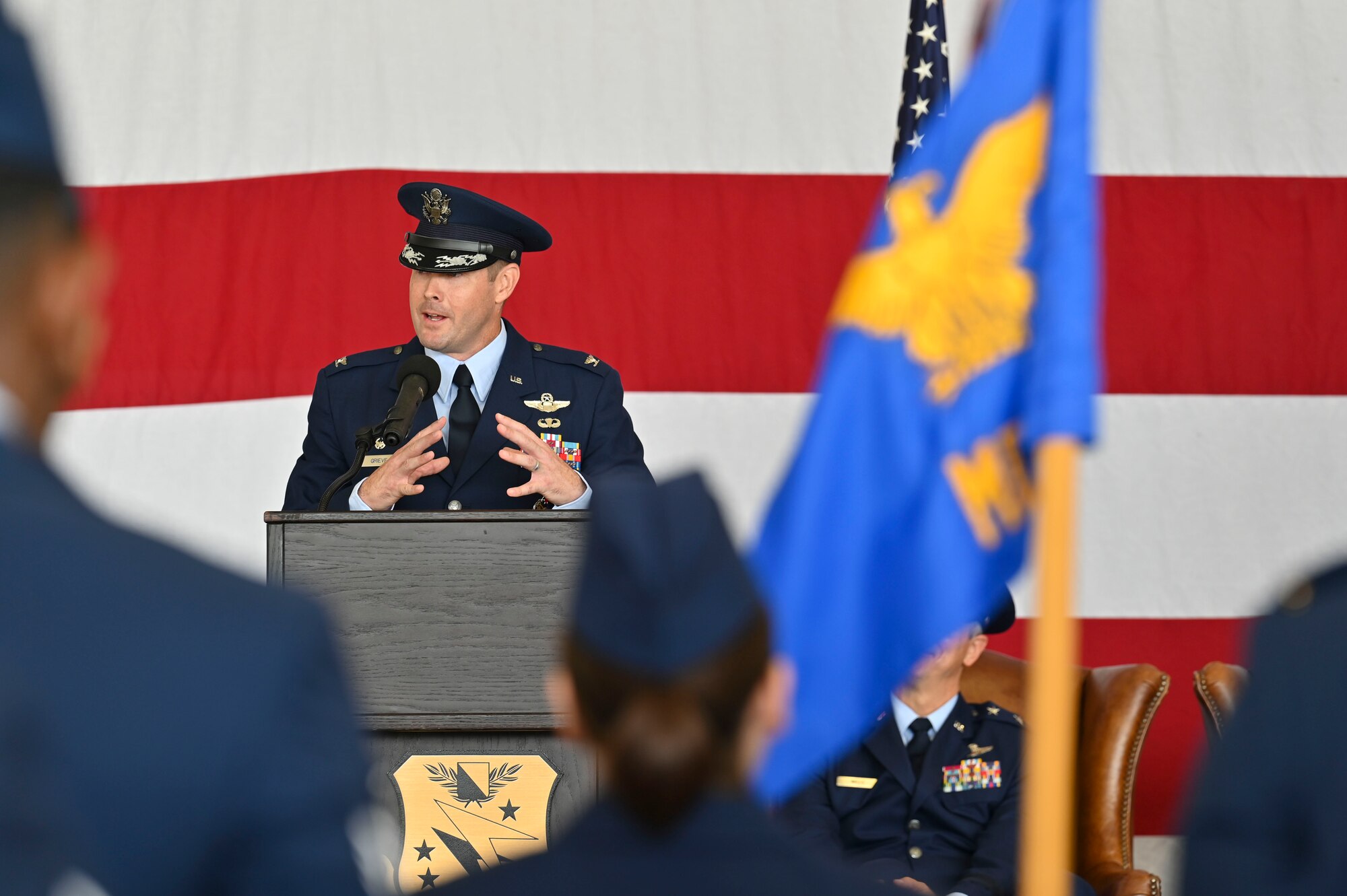U.S. Air Force Col. Justin Grieves, incoming 14th Flying Training Wing commander, deliveres his speech at the 14th FTW Change of Command ceremony on Columbus Air Force Base, Miss., July 22, 2022. Prior to this assignment Grieve was the Chief of the Nuclear Missions Planning Division, Plans and Policies Directorate, United States Strategic Command at Offutt AFB, Missouri. (U.S. Air Force Senior Airman Jessica Haynie)