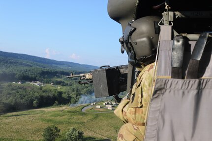 Pennsylvania Army National Guard Soldiers with Alpha Company, 2-104th General Support Aviation Battalion perform training to pass the air gunnery qualification at Fort Indiantown Gap July 21, 2022. To be fully qualified, soldiers must pass the aircrew qualification tables four, five, and six.