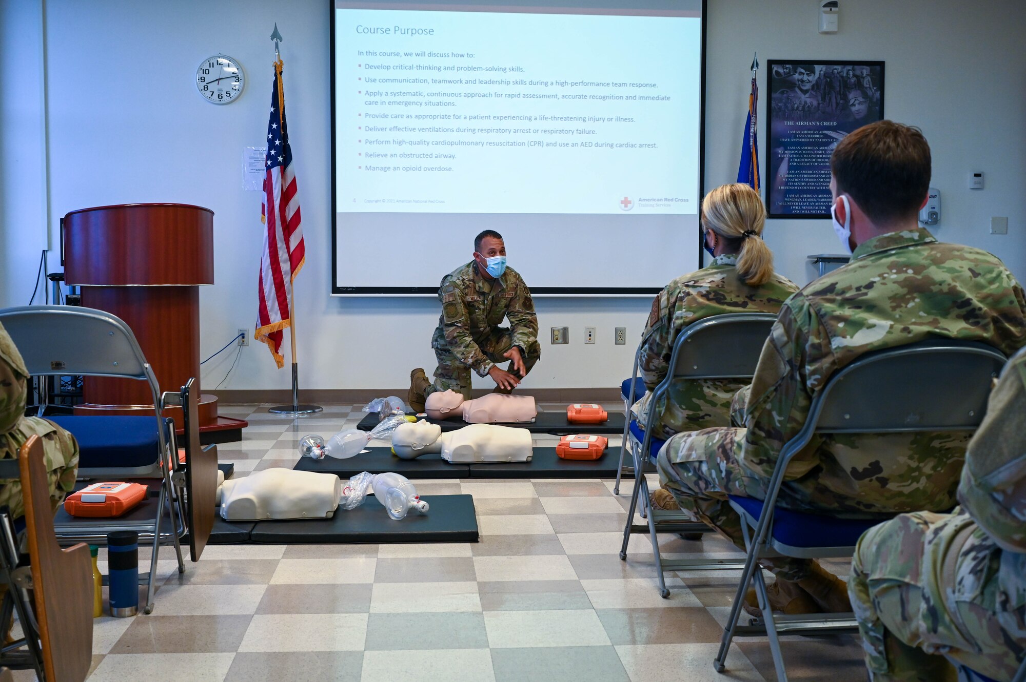 a man demonstrates CPR