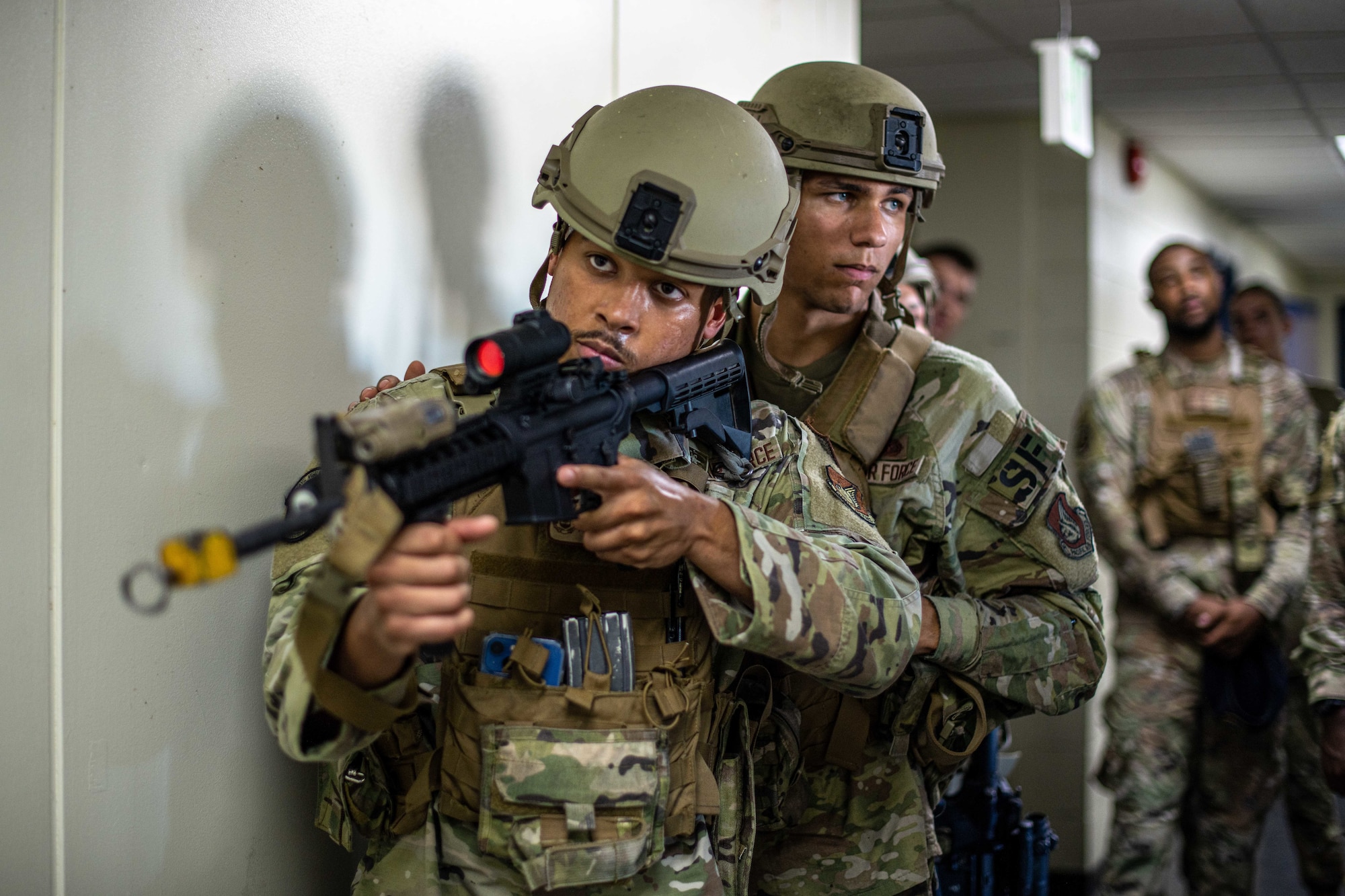 Airmen practice clearing a room.