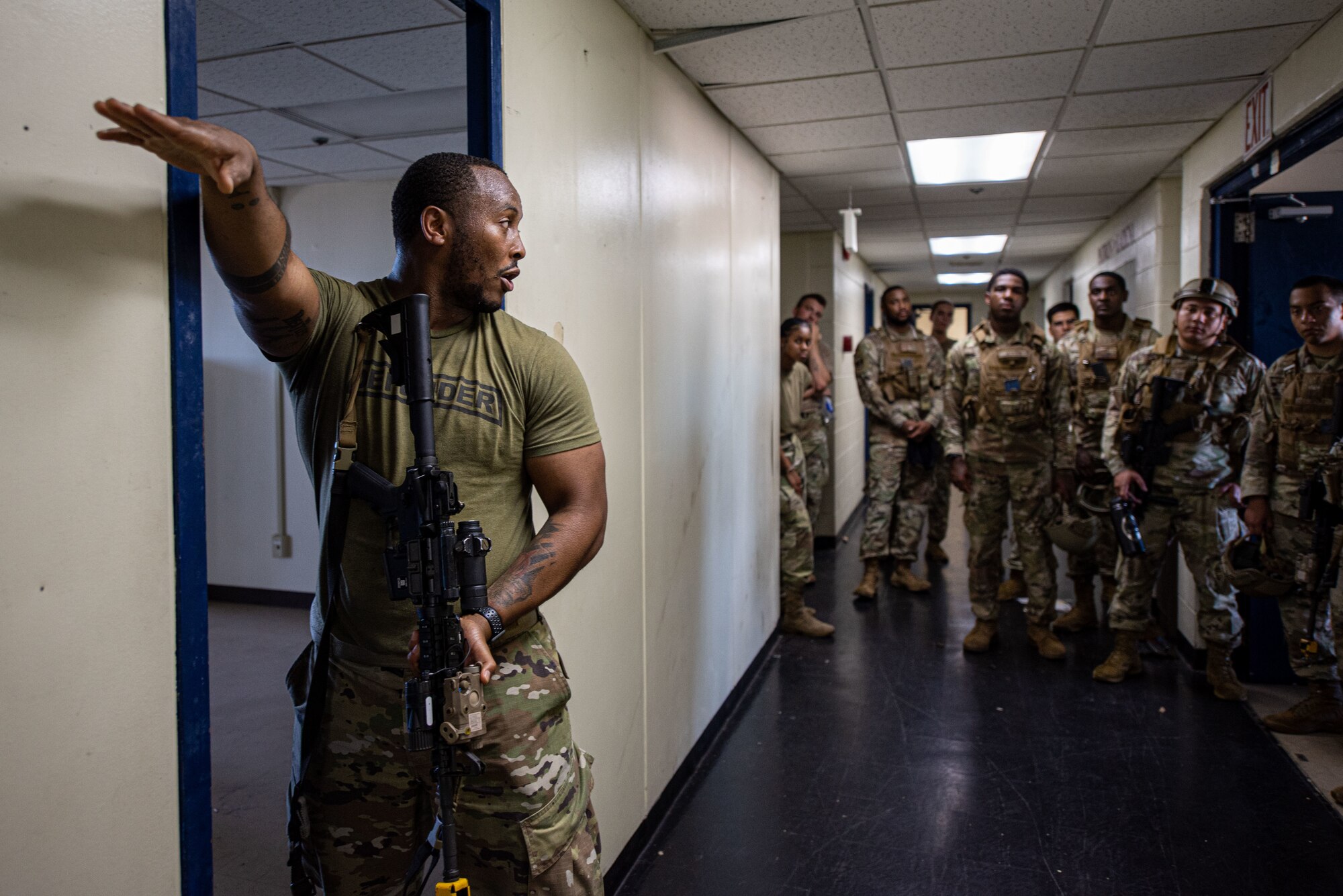 Airmen practice clearing a room.