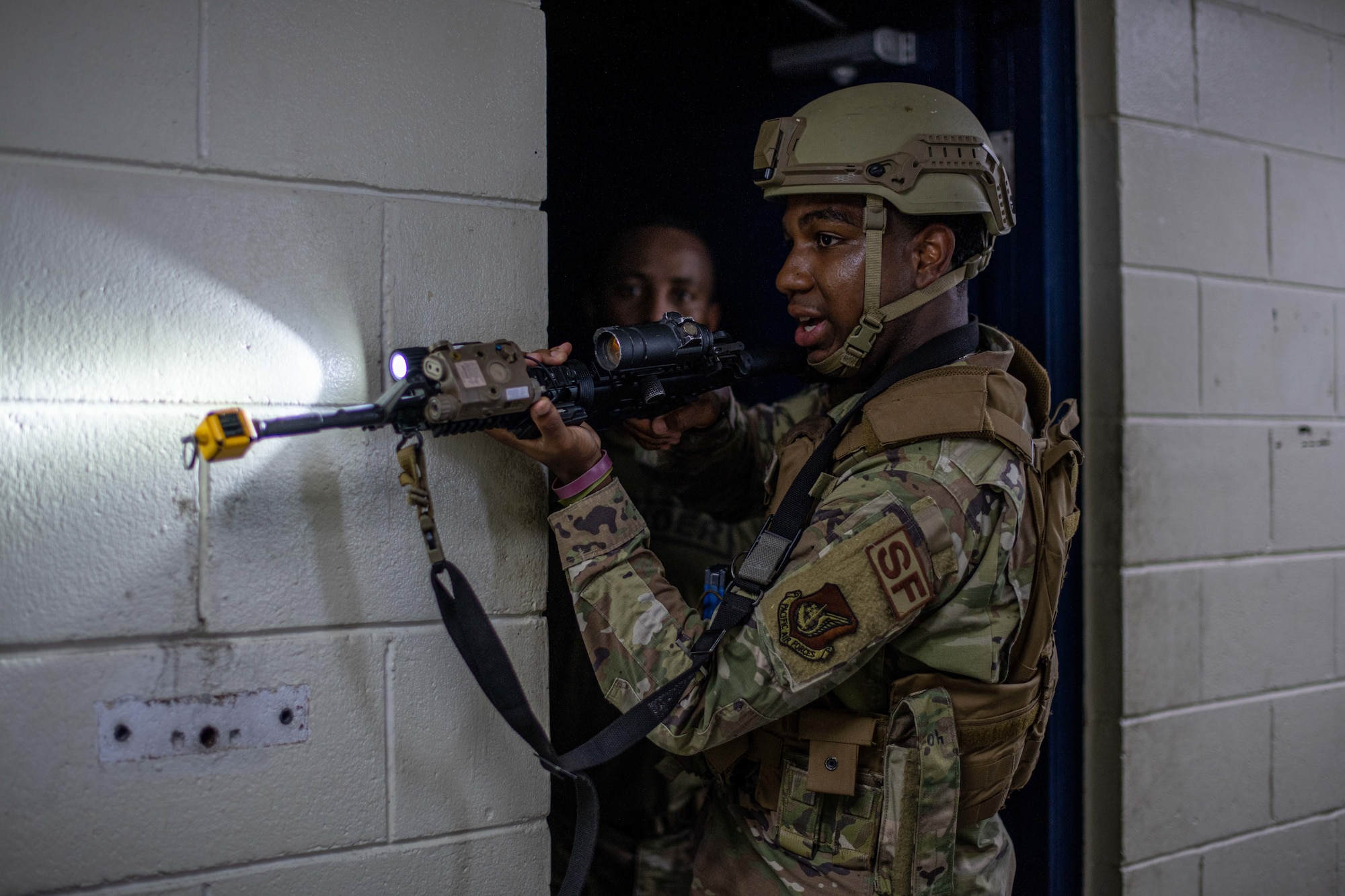 Airmen practice clearing a room.