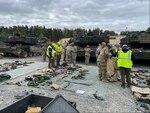 Soldiers from the 3rd Infantry Division’s 1st Armored Brigade Combat Team and personnel from the 405th Army Field Support Brigade conduct a joint inventory on Army Prepositioned Stocks-2 M1 Abrams tanks and associated secondary equipment and basic issue items at Grafenwoehr, Germany. The 1st ABCT, 3rd Inf. Div. has been deployed to Europe for about six months and will be redeploying to Fort Stewart, Georgia, soon. When the armored brigade arrived in Germany, the 405th AFSB issued a full ABCT’s worth APS-2 armored vehicles and equipment pieces to them. (Photo by Maj. Leonard Weschler)