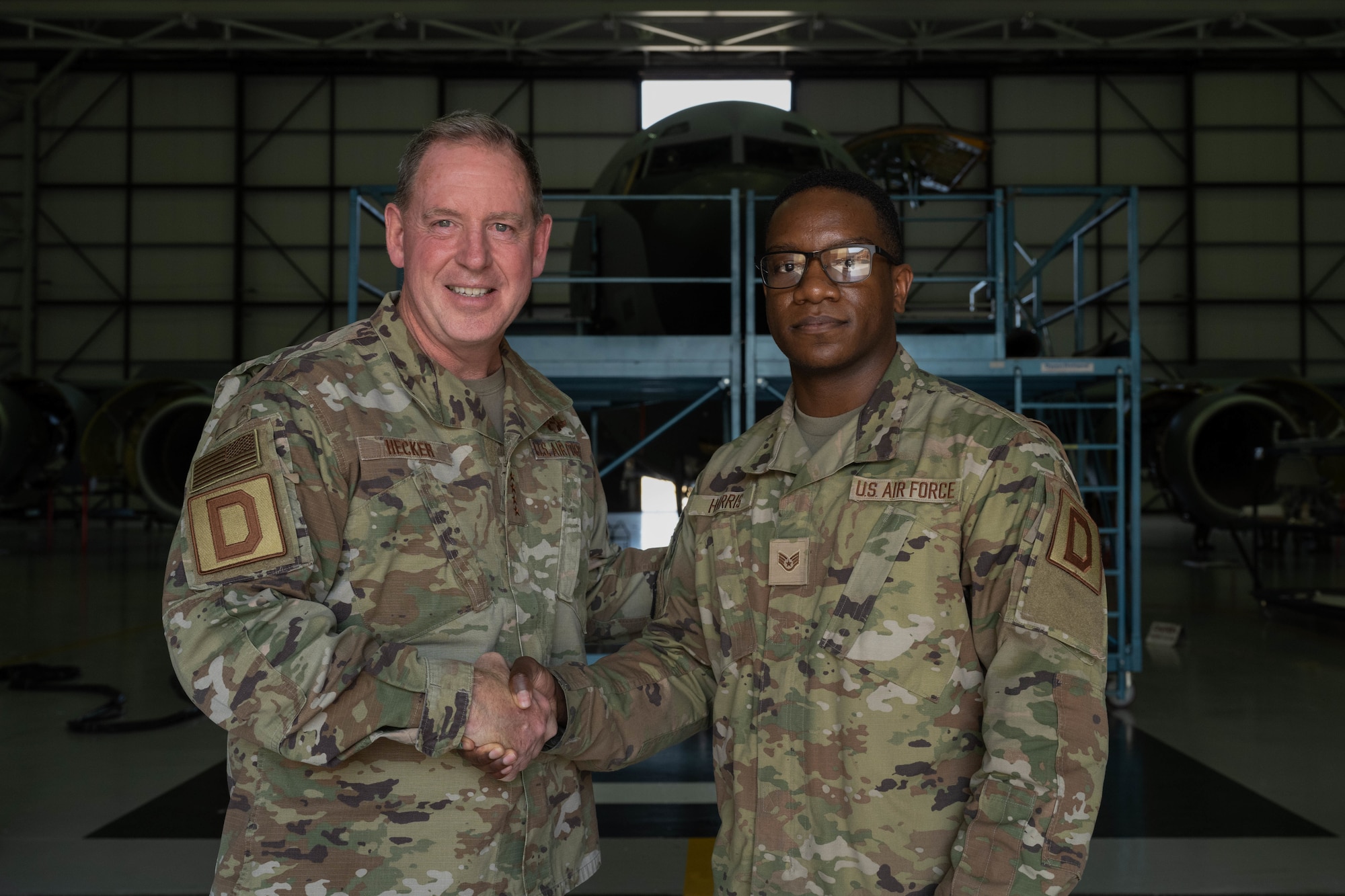 Mrs. Abby Johnson (right) briefs Mrs. Terrie Hecker (left) on the Airmen and Family Readiness Center’s resources, Royal Air Force Mildenhall, England, July 18, 2022. U.S. Air Force Gen. James Hecker, U.S. Air Forces in Europe - Air Forces Africa commander, and his spouse, Mrs. Hecker visited RAF Mildenhall during their initial command tour allowing them to get a first hand perspective of how the base is currently operating. (U.S. Air Force photo by Airman 1st Class Viviam Chiu)
