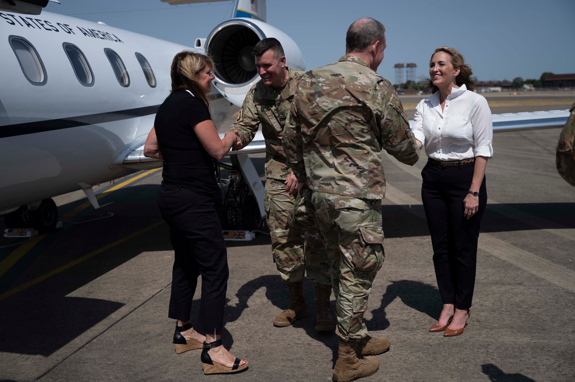 Mrs. Abby Johnson (right) briefs Mrs. Terrie Hecker (left) on the Airmen and Family Readiness Center’s resources, Royal Air Force Mildenhall, England, July 18, 2022. U.S. Air Force Gen. James Hecker, U.S. Air Forces in Europe - Air Forces Africa commander, and his spouse, Mrs. Hecker visited RAF Mildenhall during their initial command tour allowing them to get a first hand perspective of how the base is currently operating. (U.S. Air Force photo by Airman 1st Class Viviam Chiu)