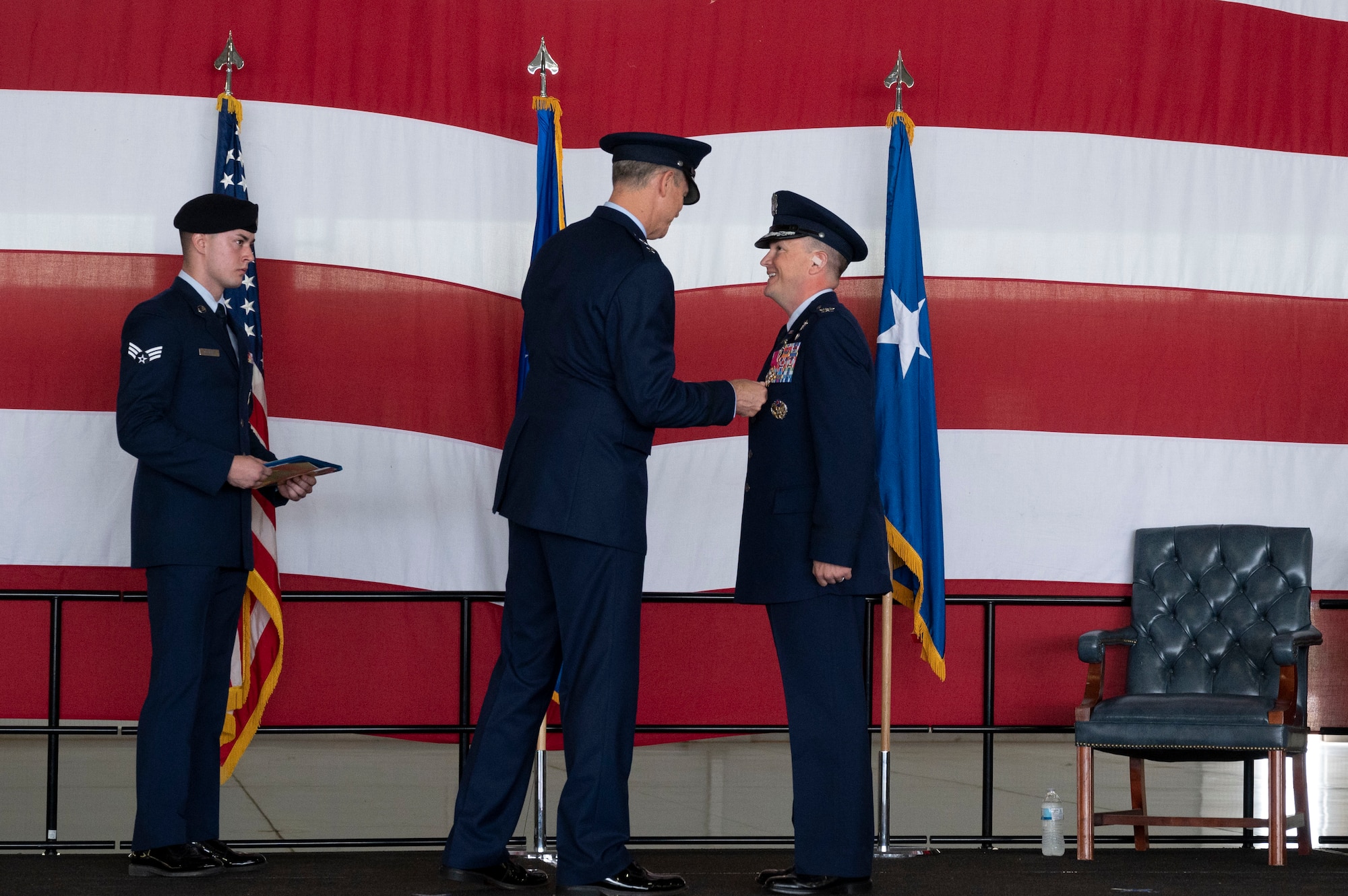 U.S. Air Force Maj. Gen. Craig Wills, 19th Air Force commander, presents a Legion of Merit medal to Col. Craig Prather, former 47th Flying Training Wing commander, during the 47th Flying Training Wing change of command ceremony at Laughlin Air Force Base, Texas, July 22, 2022. The Legion of Merit is a military award of the United States Armed Forces that is given for exceptionally meritorious conduct in the performance of outstanding services and achievements. (U.S. Air Force photo by Airman 1st Class Kailee Reynolds)