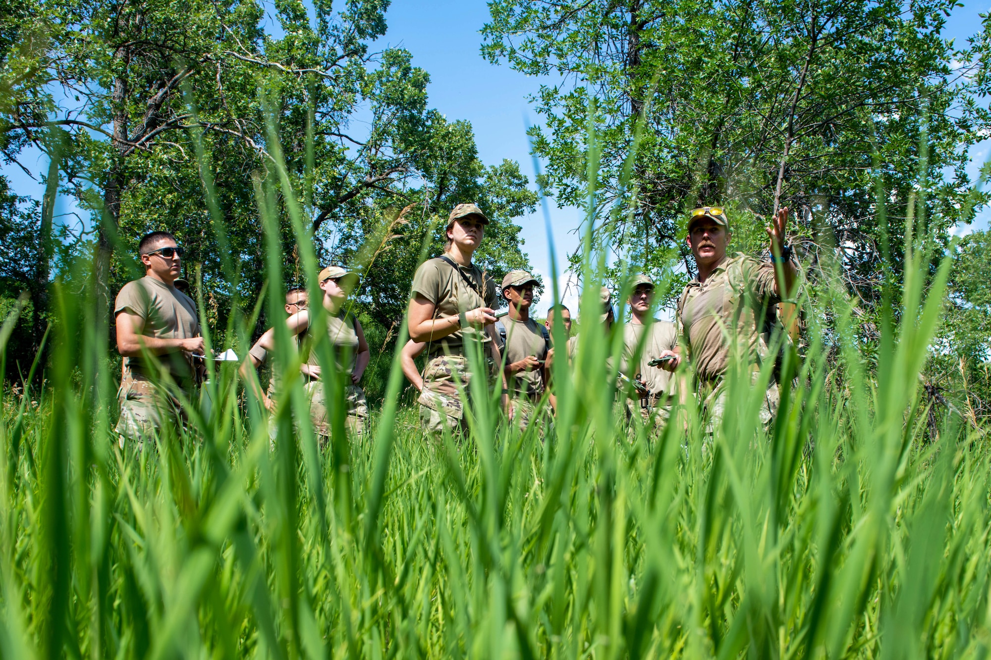 U.S. Air Force Airmen assigned to the 28th Bomb Wing participate in the first iteration of the Ellsworth Outdoor Survival Skills Course, at the Fort Meade Training Area, S.D., July 21, 2022.