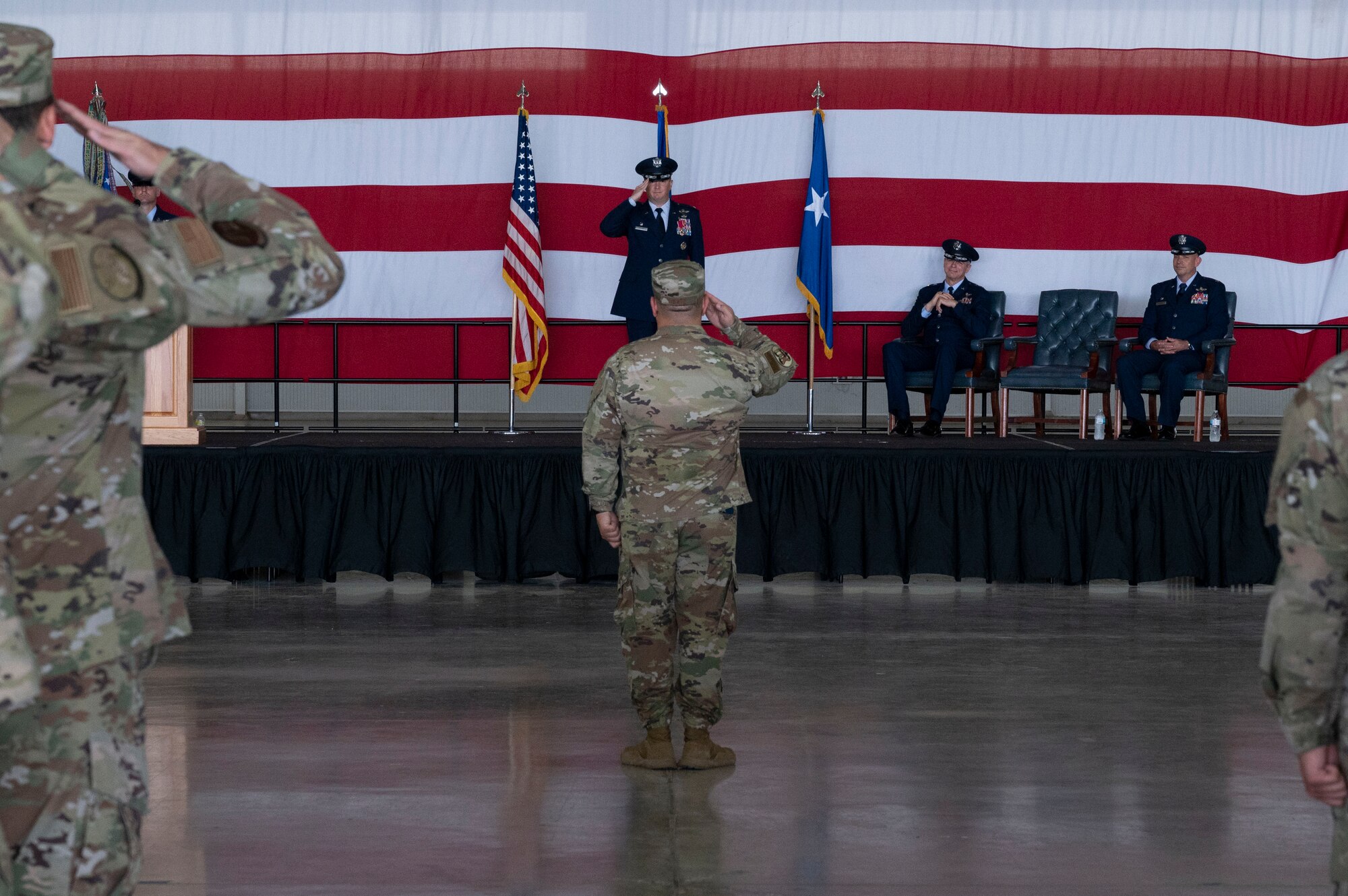 U.S. Air Force col. Craig Prather, former 47th Flying Training Wing commander, returns a final salute as commander to 47th Flying Training Wing members during a change of command ceremony at Laughlin Air Force Base, Texas, July 22, 2022. As commander, Davidson will oversee nearly 2,800 military and civilian personnel engaged in executing more than 61,000 aircraft sorties yearly in support of  Laughlin's Specialized Undergraduate Pilot Training mission. (U.S. Air Force photo by Airman 1st Class Kailee Reynolds)