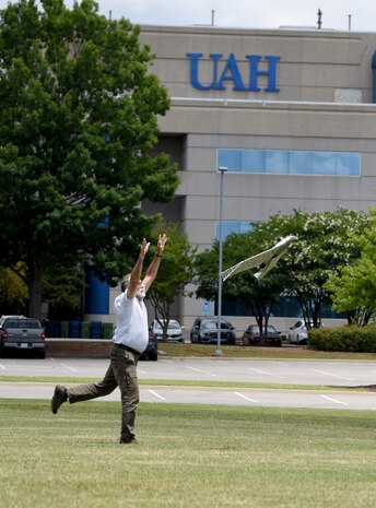 HNC’s George Wade releases a drone for a flight over the UAH campus.
