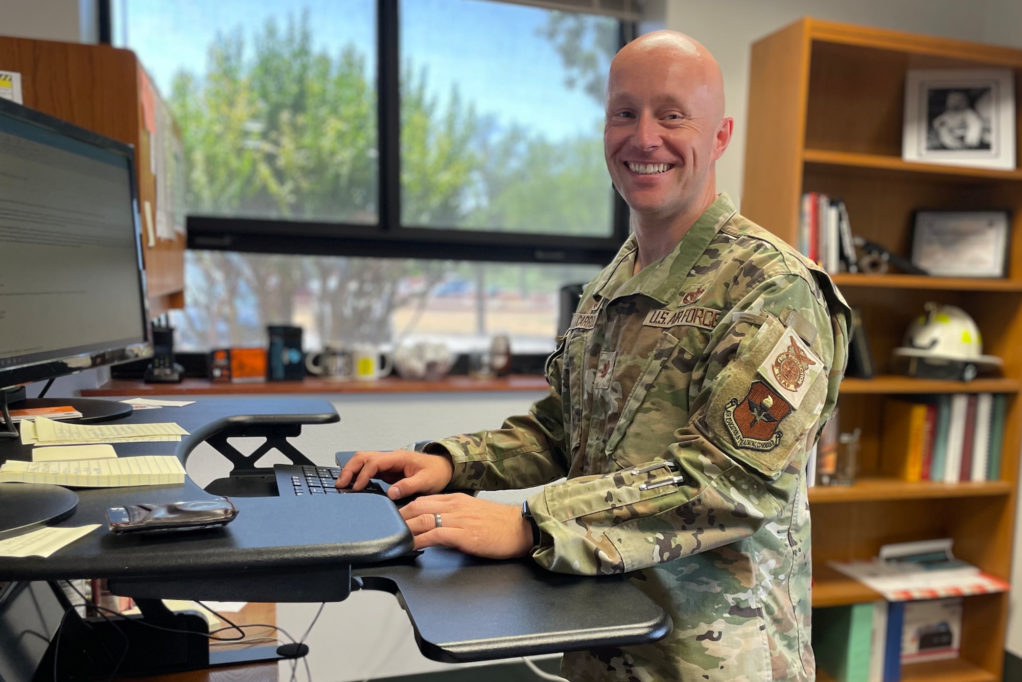 U.S. Air Force Maj. Joshua Carroll, 17th Civil Engineer Squadron commander, works at his desk, at Goodfellow Air Force Base, Texas, July 18, 2022. Carroll’s previous assignment was a student at the U.S. Army Command & General Staff College at Fort Leavenworth, Kansas. (U.S. Air Force photo by Senior Airman Abbey Rieves)