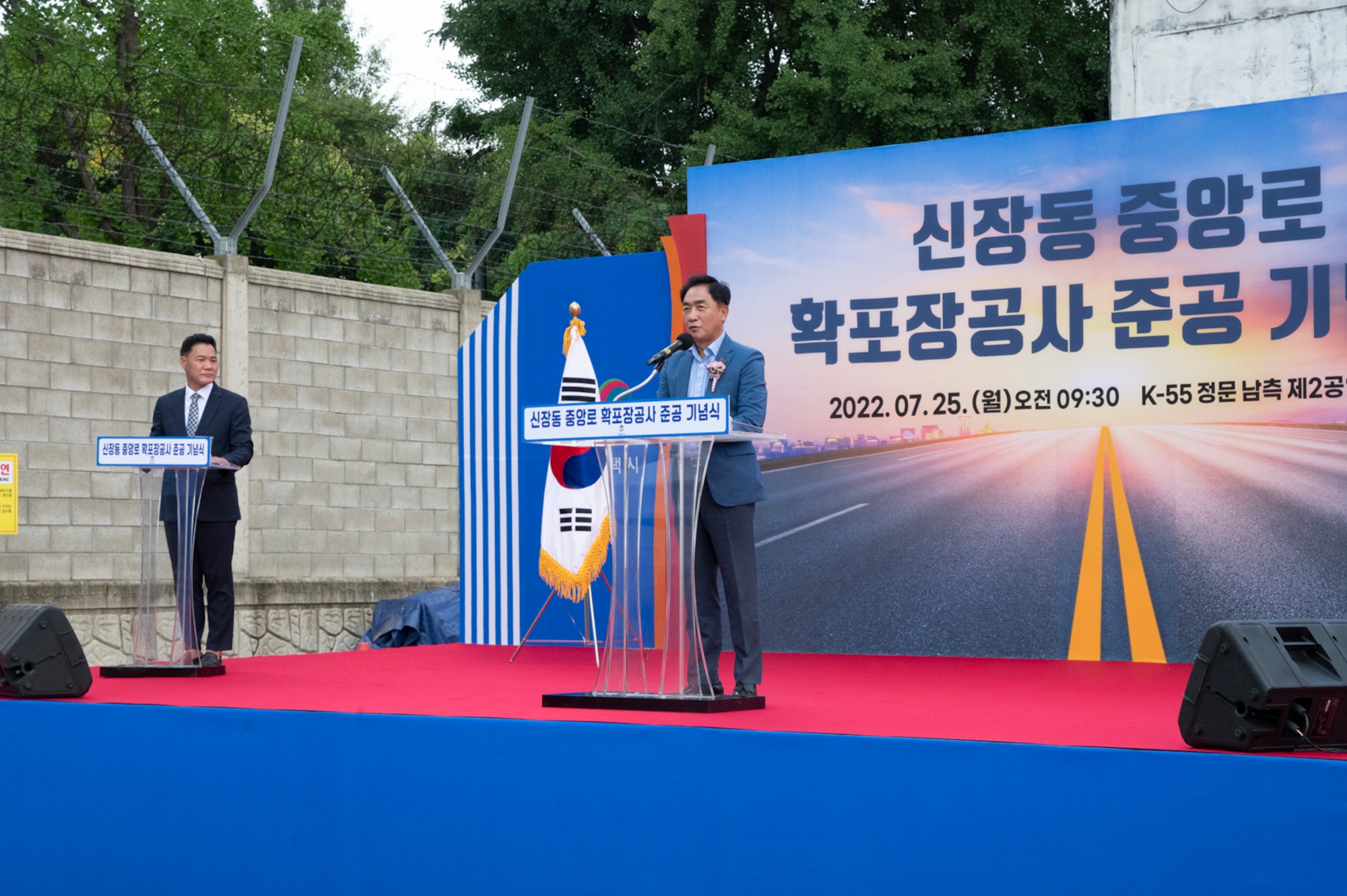 Jang Seon Jung, Pyeongtaek mayor, speaks to the Songtan community during a ribbon cutting ceremony celebrating the newly constructed roundabout outside of Osan Air Base, Republic of Korea, July 25, 2022.