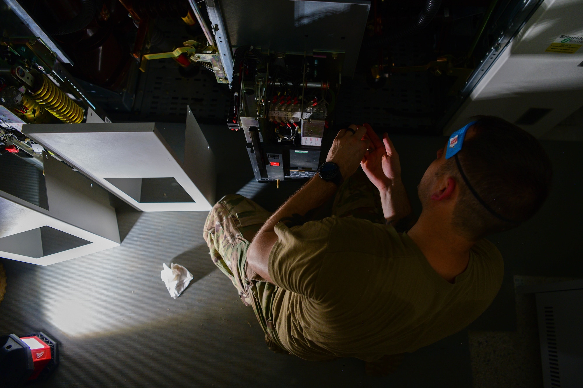 U.S. Air Force Master Sgt. Blake Meyer, Civil Engineer Maintenance, Inspection and Repair Team electrical noncommissioned officer in charge, performs routine maintenance on a high voltage circuit in a substation at Aviano Air Base, Italy, June 21, 2022. CEMIRT can execute low, medium and high voltage circuit breaker testing maintenance and switchgear upgrade projects for improved operations. (U.S. Air Force photo by Senior Airman Brooke Moeder)