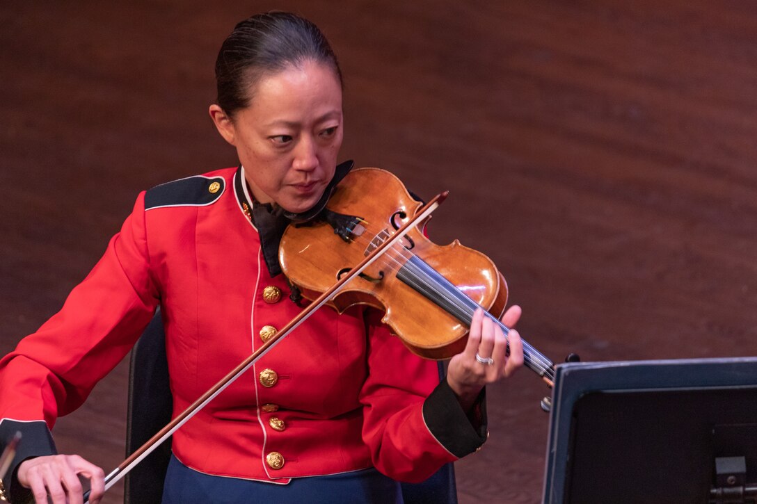 Violinist Gunnery Sgt. Chaerim Smith performs in the Marine Chamber Orchestra on July 23, 2022. (U.S. Marine Corps photo by Staff Sgt. Chase Baran/released)