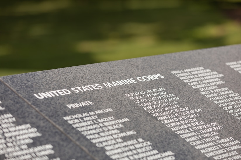 Names of Marines are shown on the Korean War Veterans Memorial Wall of Remembrance.