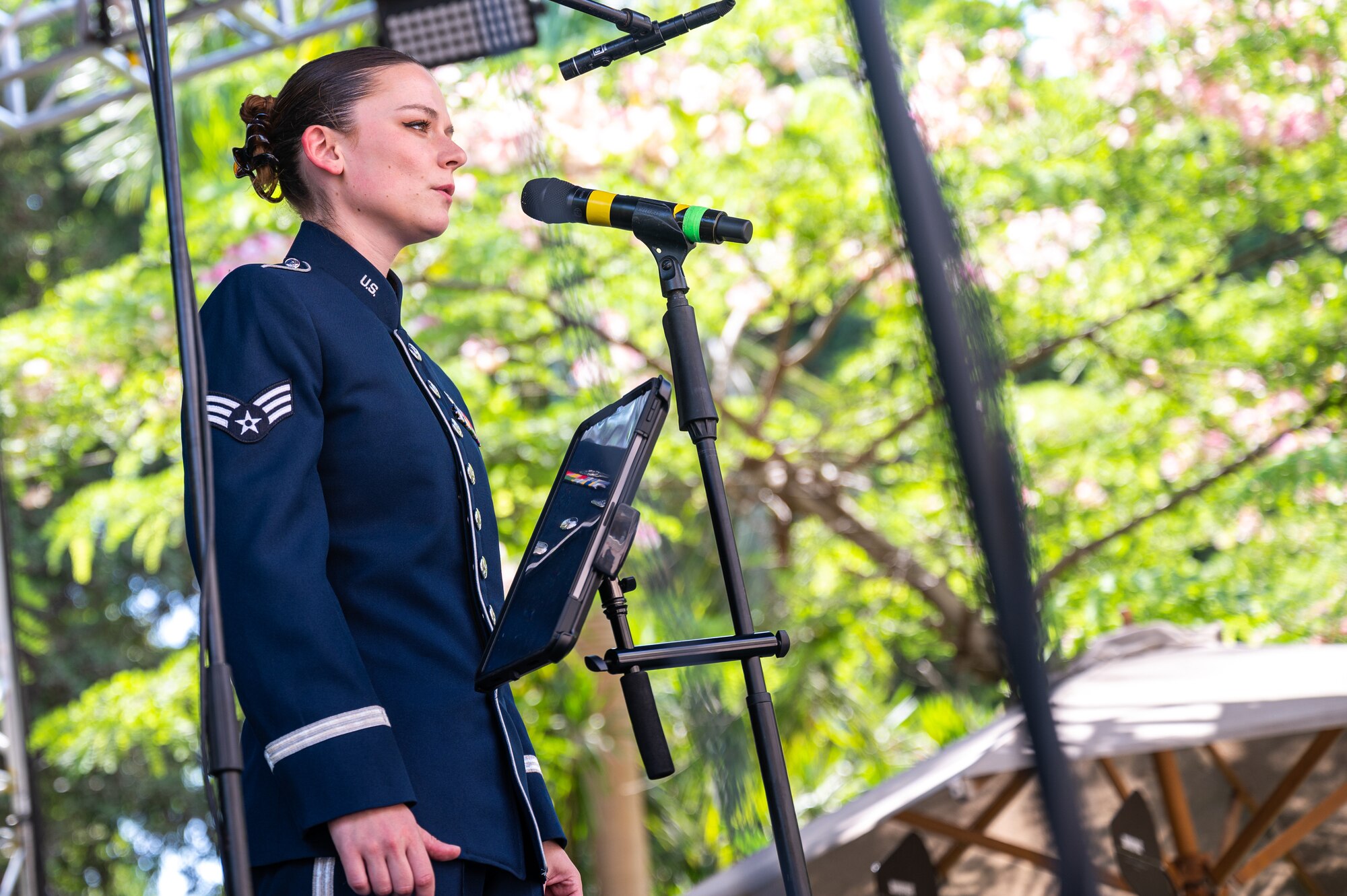 Senior Airman Dana Bowers, Air Forces Central Band vocalist, sings the U.S. National Anthem at the U.S. Embassy-Egypt Independence Day celebration in Cairo, Egypt, July 20, 2022.