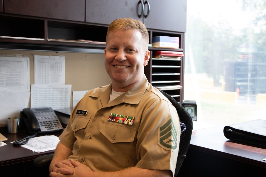 U.S. Marine Corps Staff Sgt. Justin Baldwin, a Prior Service Recruiter with PSR Station 6, 6th Marine Corps District, Marine Corps Recruiting Command, was awarded the Centurion award in Charlotte, North Carolina, July 14, 2022. Centurion is an accomplishment recruiters achieve by enlisting at least 100 Marines within 36 months; for a prior service recruiter, they have to reach 100 Marines within 18 months. (U.S. Marine Corps photo by Sgt. Kyle McNan)