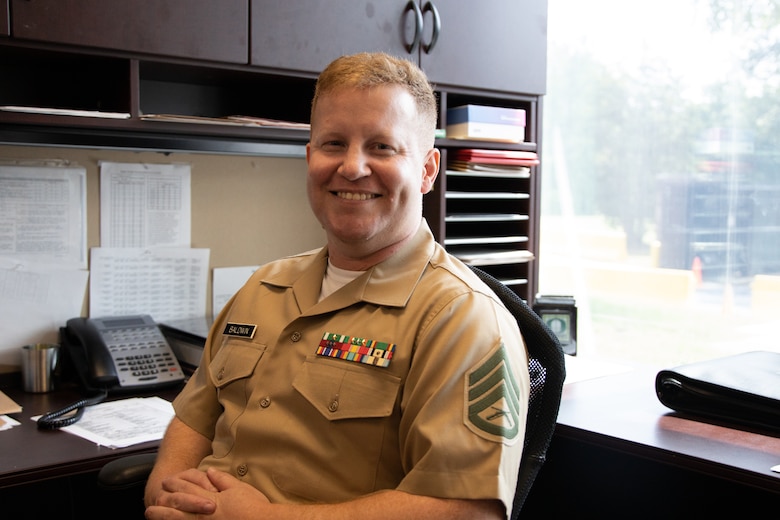 U.S. Marine Corps Staff Sgt. Justin Baldwin, a Prior Service Recruiter with PSR Station 6, 6th Marine Corps District, Marine Corps Recruiting Command, was awarded the Centurion award in Charlotte, North Carolina, July 14, 2022. Centurion is an accomplishment recruiters achieve by enlisting at least 100 Marines within 36 months; for a prior service recruiter, they have to reach 100 Marines within 18 months. (U.S. Marine Corps photo by Sgt. Kyle McNan)