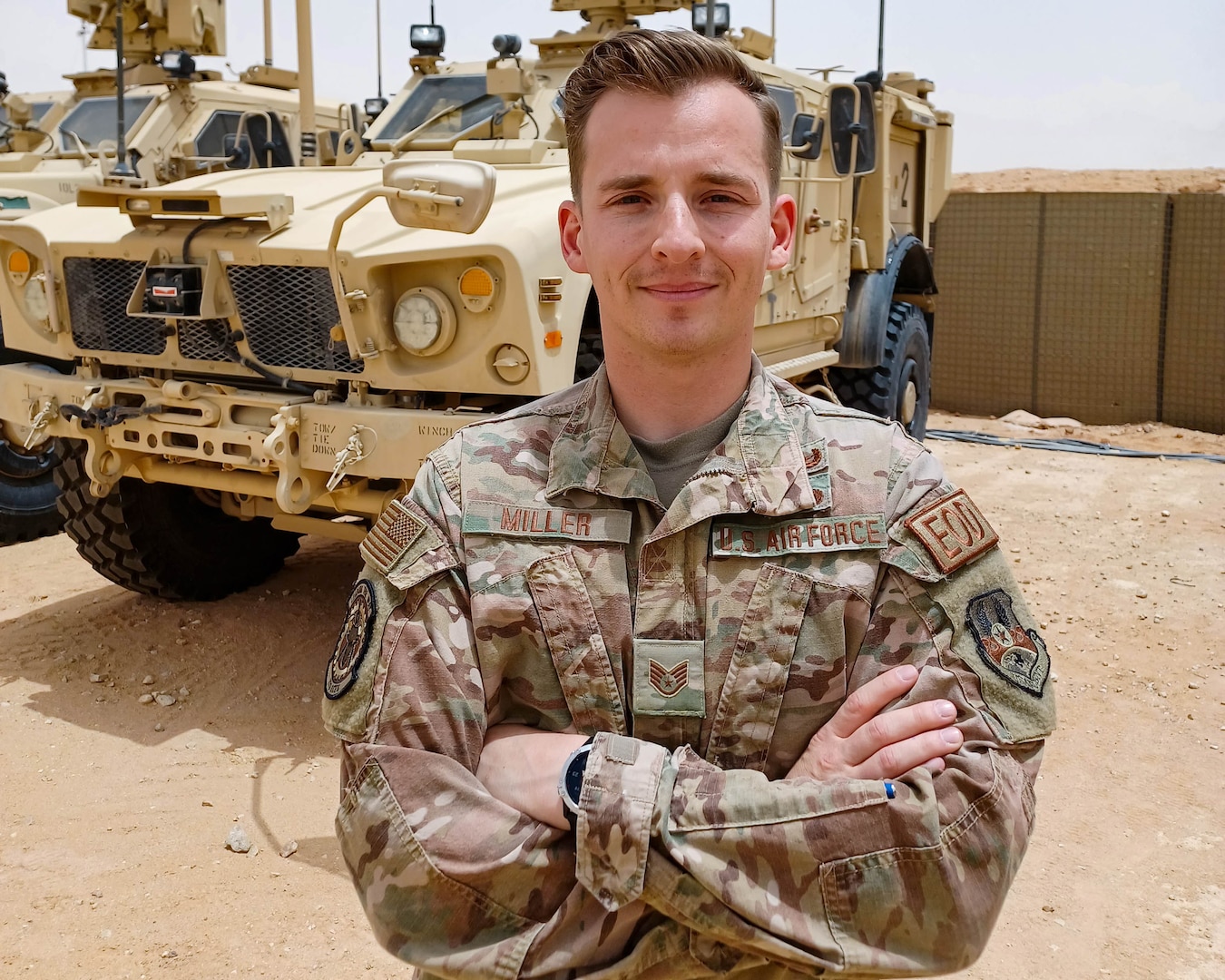 U.S. Air Force Staff Sgt. Vincent Miller, an Explosive Ordnance Disposal craftsman with the 378th Expeditionary Civil Engineer Squadron, poses in front of a Mine Resistant Ambush Protected All-Terrain Vehicle at Prince Sultan Air Base, Kingdom of Saudi Arabia.