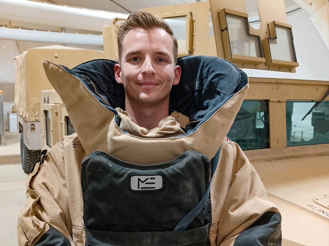 U.S. Air Force Staff Sgt. Vincent Miller, an Explosive Ordnance Disposal craftsman with the 378th Expeditionary Civil Engineer Squadron, poses in a bomb suit at Prince Sultan Air Base, Kingdom of Saudi Arabia.