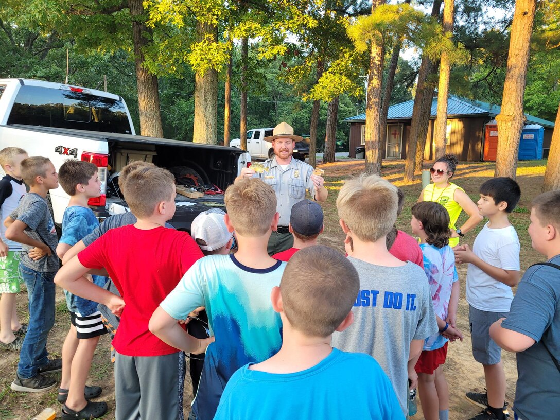 Ranger Wes Davenport explains to campers at Camp Currie conservation camp how to identify different fish and wildlife found throughout the area. (USACE Photo by WES DAVENPORT)
