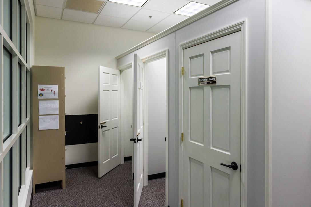 Doors open to Lactation stalls in the lactation room.