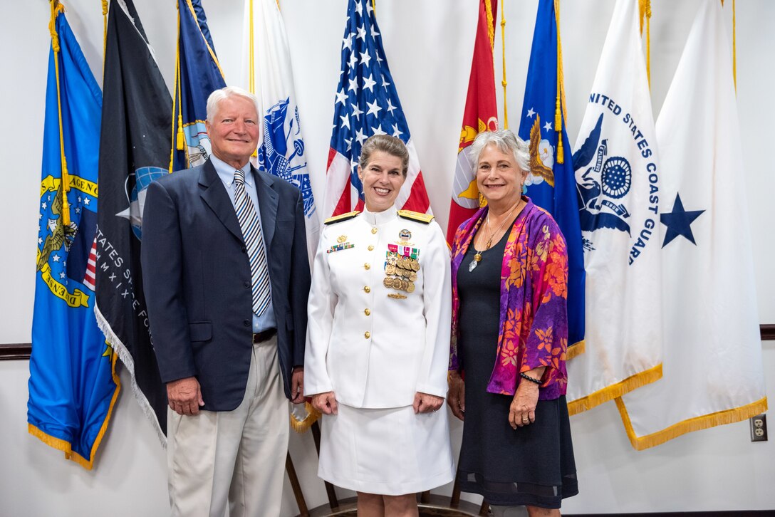 Family and friends of Navy Rear Adm. Kristen Fabry gather for a light breakfast prior to the Defense Logistics Agency Land and Maritime Change of Command and Retirement Ceremony July 22. Fabry is retiring this month after 31 years of service in the Navy.